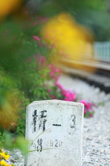 Stone milestone marker along a trail